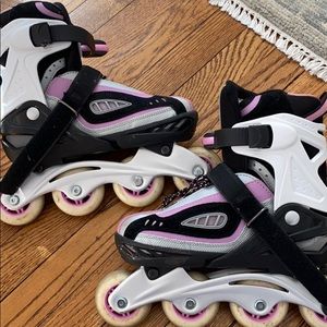 Pink rollerblades, size adjustable (4-7)